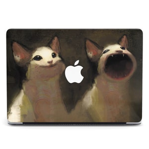 May include: A laptop skin with a digital illustration of two cats. One cat is smiling and the other is yelling with its mouth open. The background is a dark brown color.