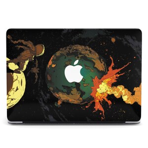 May include: A black laptop skin with a colorful design featuring a planet, a spaceman, and a white apple logo. The design is reminiscent of a space scene with a planet exploding.