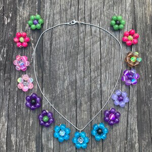 Beautiful Malaysian Jade or holographic bead flower pendant on silver chain