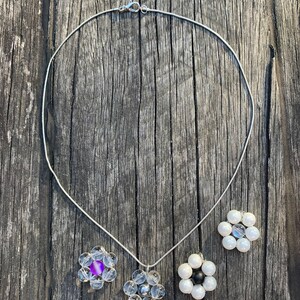 Beautiful pearl, stone, glass bead flower pendant on silver necklace