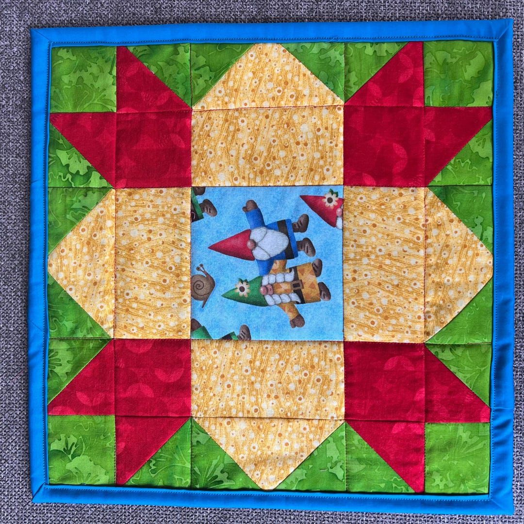 Gathering Gnome Quilted Table Topper NCU0DDK923
