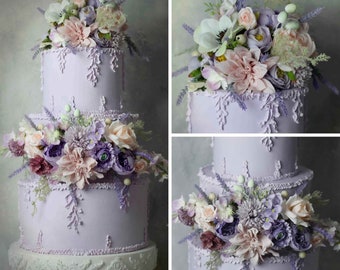 flower cake topper for wedding cake, lilac flowers for cake, flower arrangement for cakes, flowers for cakes, floral decoration for cake.