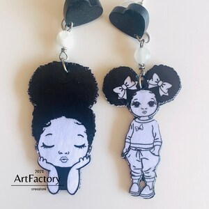 Orecchini di carta leggerissimi, bianco e nero a tema cartoon
