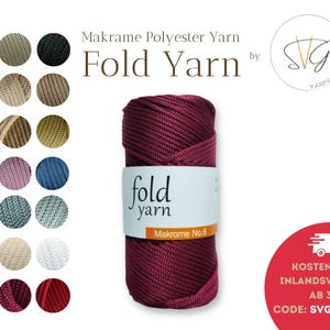 May include: A burgundy spool of Fold Yarn, a polyester macrame yarn, is the central focus. The image features a selection of yarn colours and the brand logo. The label reads "Fold Yarn" and "Makrome No. 6".