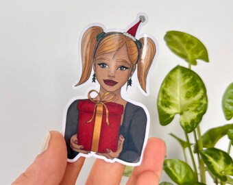 Christmas girl with a gift