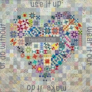 May include: A quilt with a heart-shaped design made of colourful fabric squares. The quilt is surrounded by a grey border with the text "use it up, wear it out, or do without" and "make it do". The heart is labelled "Heartfelt BOM".