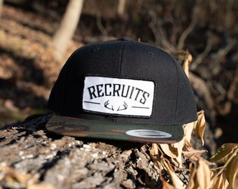 Recruits Camo and Black w/ White Patch Snapback