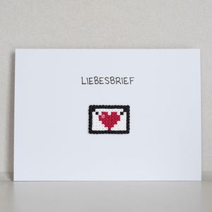 Postal *Carta de amor* con motivo de cuentas de hierro