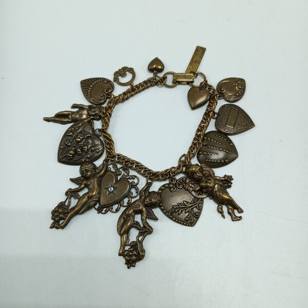 Vintage Jan Michaels San Francisco Charm Bracelet with A Variety of Figural Hearts and Cherubs