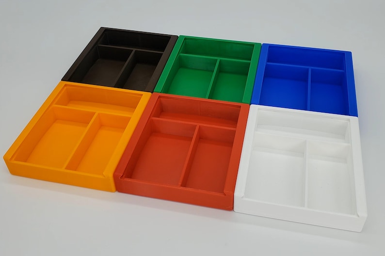 May include: Six plastic storage boxes with dividers. The boxes are in different colors: orange, red, green, blue, white, and brown.