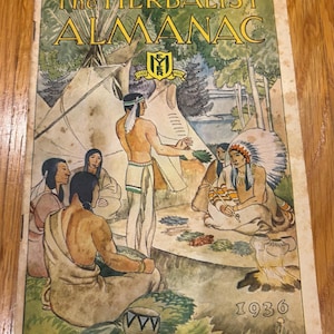 May include: A vintage 1936 booklet titled The HERBALIST ALMANAC featuring a watercolor illustration of Indigenous people gathered around a campfire and teepees. The cover includes a central logo with the text MYER and various herbal plants.