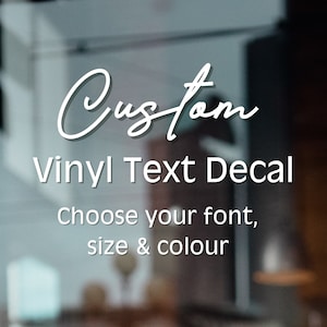 May include: Custom Vinyl Text Decal, choose your font, size & colour. A white decal on a glass surface.