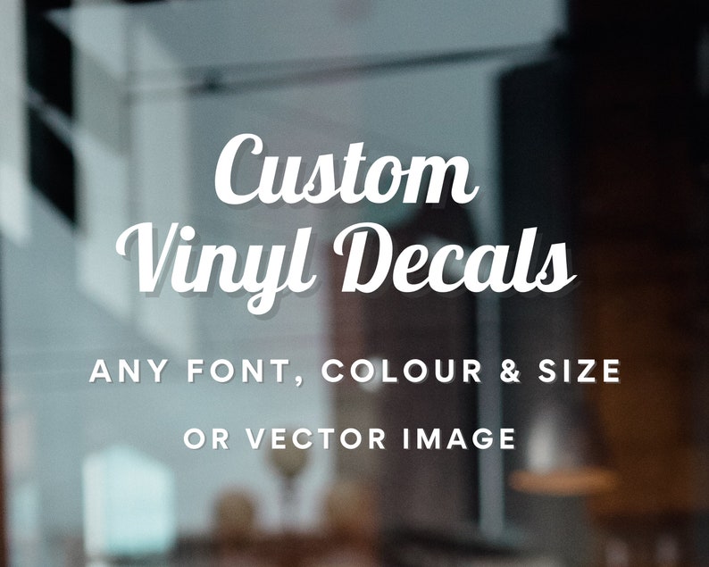May include: Custom vinyl decals with the text "Custom Vinyl Decals" in a white cursive font. The text is on a blurry background. The text below the main text reads "ANY FONT, COLOUR & SIZE OR VECTOR IMAGE".