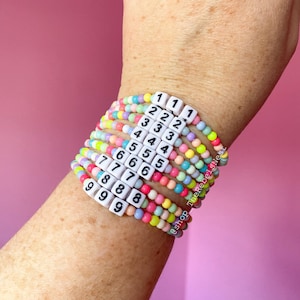 Angel Number Bracelet made with 4mm rainbow colored gumball beads - 11:11 bracelet