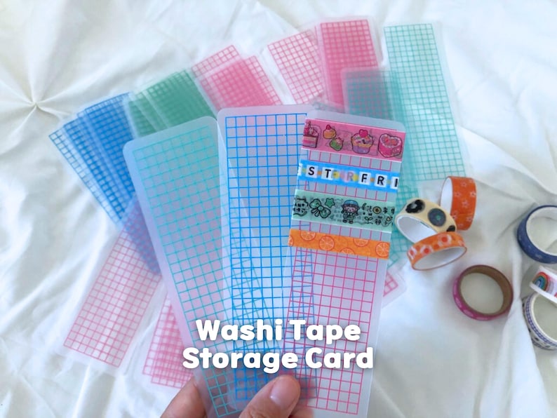Clear PVC washi tape sampler card for planner and journaling accessories, showing slim grid design in pink, green, and blue colors.