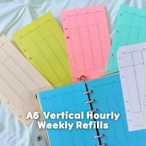 May include: A collection of A6 vertical hourly weekly planner refills in various colors including yellow, pink, turquoise, blue, cream, and white. Each sheet features a grid layout with days of the week and hourly time slots, with punched holes for binder insertion.