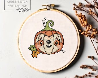 May include: Cross stitch pattern PDF of a cute pumpkin with a face. The pumpkin is orange with a green stem and leaves. The face is white with black eyes and a black mouth.