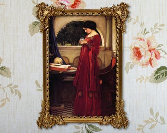 May include: A framed painting of a woman in a red dress holding a crystal ball. She is standing in a room with a skull and a book on a table. The painting is in a gold frame.