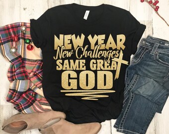 May include: Black t-shirt with gold glitter lettering that reads "New Year New Challenges Same Great God".