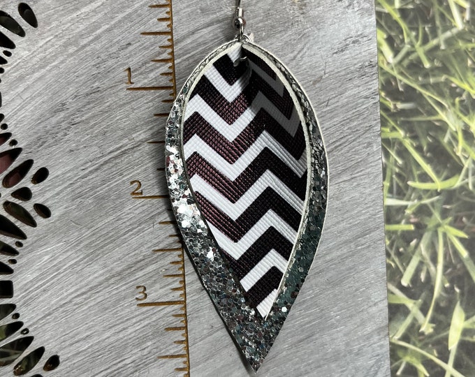 Chevron silver glitter pinched petal earrings. Black chevron earrings