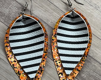 Black and white stripes with orange pinched earrings