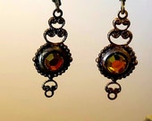 Old World Style Crystal Marea Gold Green Crystal spyglass with a Fancy Filigree brass ox drop, handmade Earrings. Heirloom look.
