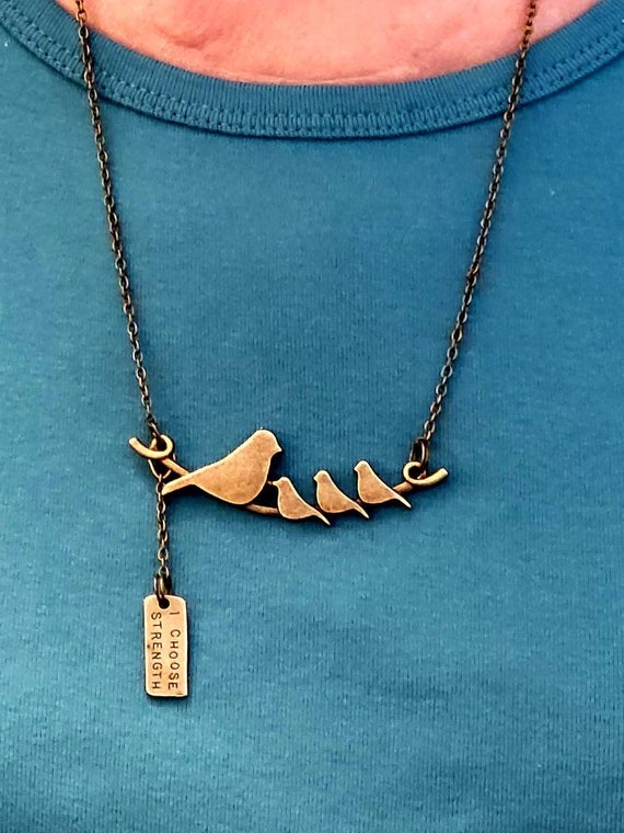 Vintage bird shop necklace