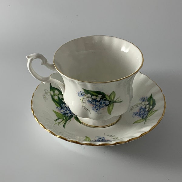 Royal Albert  Tea Cup and Saucer Set with Lily Valley Flowers with Gold trim on cup and Saucer