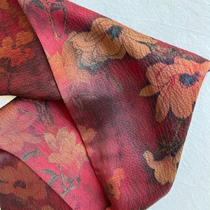 May include: A rustic wooden sign with the text "Welcome to our home" in white lettering. The sign features a distressed finish and a simple, inviting design, perfect for front door decor.