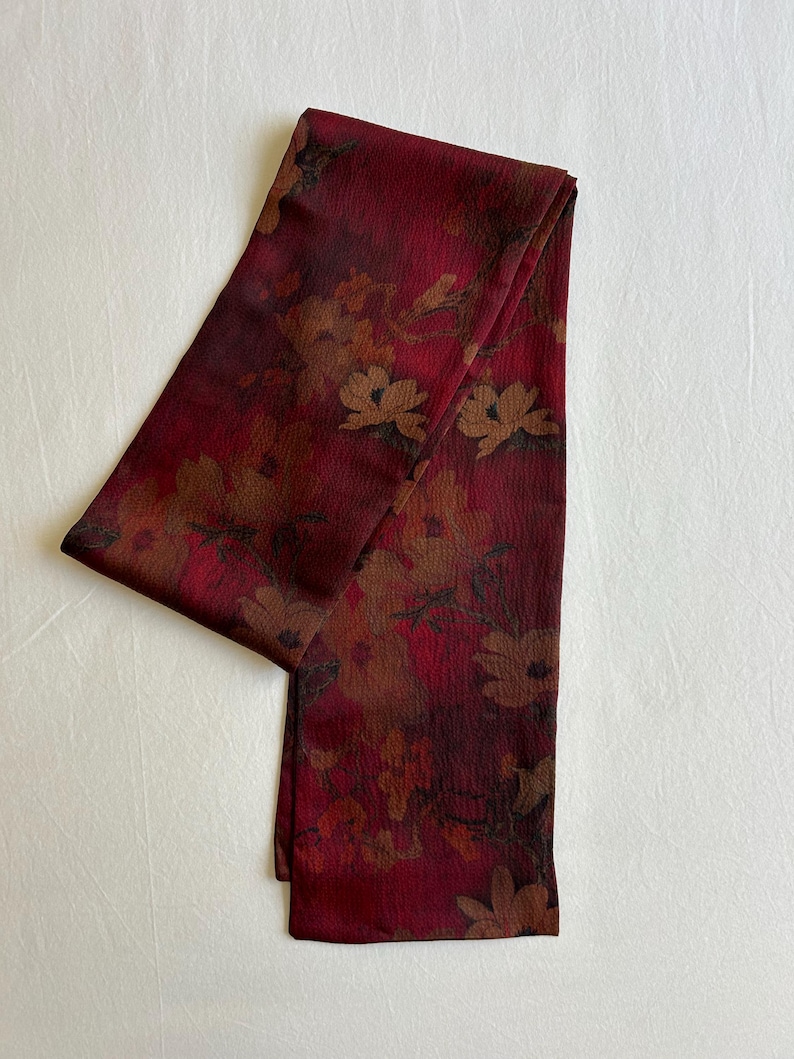 May include: A set of three ceramic mugs with a speckled, matte finish. The mugs are in shades of cream, light gray, and dark gray. Each mug has a simple, minimalist design, perfect for coffee or tea.