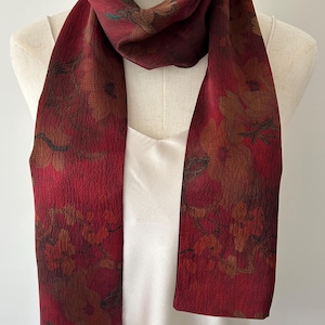 May include: A rustic wooden sign with the text "Welcome to our home" in white lettering. The sign features a distressed finish and a simple, inviting design, perfect for entryway decor.