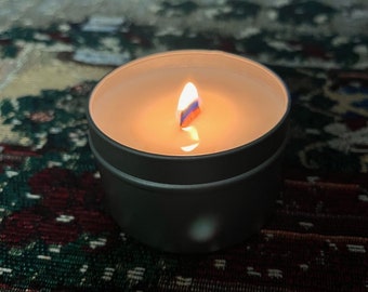 4oz Woodwick candle with an Oakmoss and Amber Scent