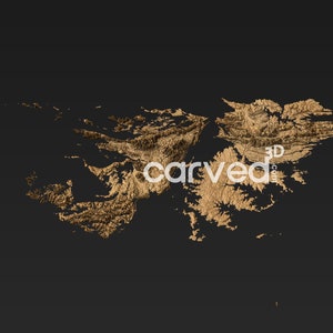 May include: A 3D-printed model of a mountainous landscape, rendered in a gold color. The model is set against a dark gray background. The text "carved3d.com" is visible in the center of the image.