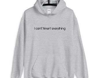 May include: A gray hooded sweatshirt with the text "I can't 'Amen' everything." printed in black on the front.