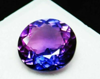 A PAIR OF VERY RARE 4x3mm OVAL-FACET PURPLE/BLUE NATURAL TANZANITE GEMSTONE 