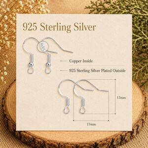 May include: A pair of 925 Sterling Silver earring hooks, 17mm in length, with a copper core and silver plating. The image shows two sets of hooks, with the text "925 Sterling Silver" and details about the materials used.