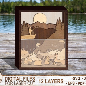 May include: A 12-layer laser cut wooden art piece depicting a fisherman casting a line in a lake with a mountain and sun in the background. The bottom layer shows fish and underwater plants.