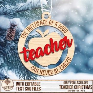 May include: A wooden Christmas ornament shaped like an apple with the text "THE INFLUENCE OF A GOOD TEACHER CAN NEVER BE ERASED" around the edge. The word "teacher" is in red and inside the apple shape.