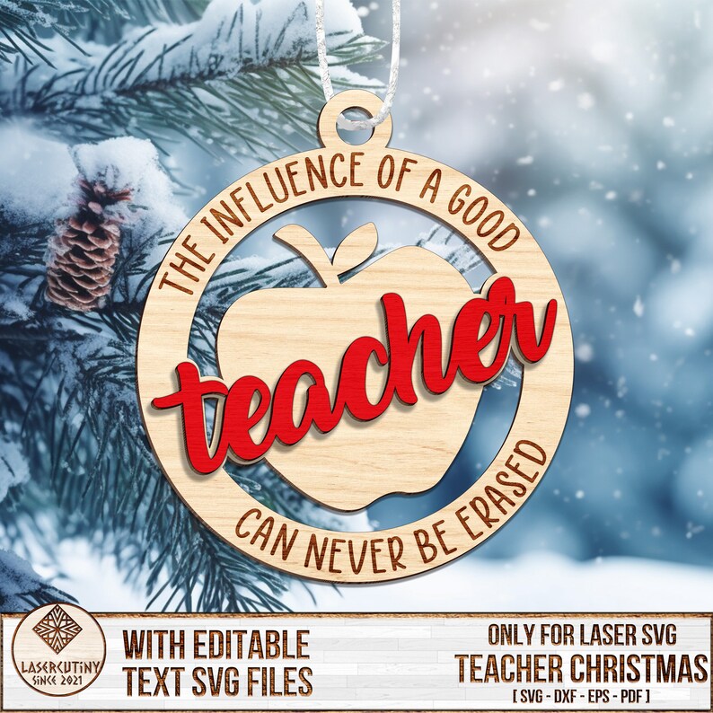 May include: A wooden Christmas ornament shaped like an apple with the text "THE INFLUENCE OF A GOOD TEACHER CAN NEVER BE ERASED" around the edge. The word "teacher" is in red and inside the apple shape.