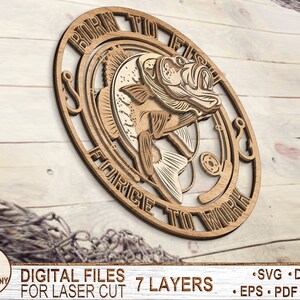 May include: A wooden sign with a fish and the text "Born to Fish Force to Work" in a circle. The sign is made for laser cutting and has 7 layers.