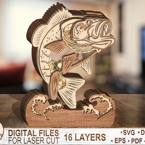 May include: A wooden laser cut model of a bass fish jumping out of the water. The fish is detailed with scales and fins. The model is made up of 16 layers and is ready to be assembled.