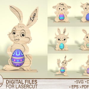 May include: Wooden Easter decorations featuring a bunny holding an Easter egg with a purple, blue, and yellow design. The bunny has the name "Lucas" on its ear. Other designs include a lamb, cow, and additional bunnies. The text "DIGITAL FILES FOR LASERCUT" is also present.