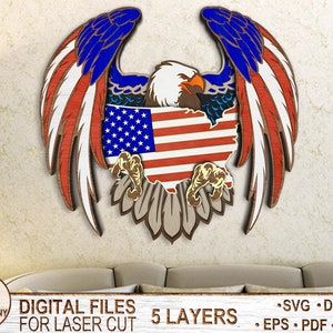 May include: A five-layer laser cut design of an American bald eagle with its wings spread wide. The eagle is holding an American flag in its talons. The design is perfect for patriotic home decor.