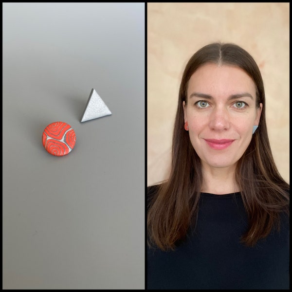 Mismatched stud earrings of metallic grey polymer clay and carrot red abstract pattern, fimo schmuck, non-bending nails