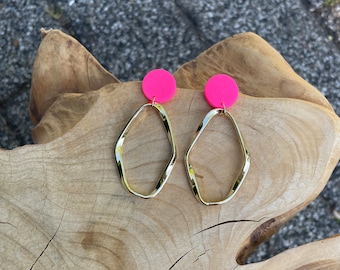 Statement earrings made of neon fuchsia polymer clay and gold colored irregular hoops, hot pink, gift for her