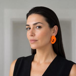 Statement stud earrings whimsical shape orange polymer clay earrings spiral design vibrant jewelry gift for her fancy earrings orange big