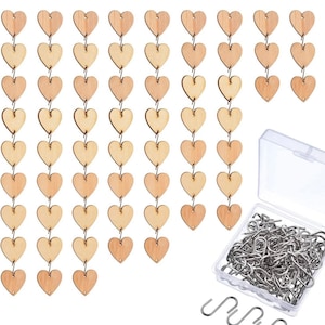 May include: A set of wooden heart-shaped ornaments with metal hooks for hanging. The hearts are arranged in rows, and there are a total of 48 hearts in the set. The hooks are packaged in a clear plastic container.