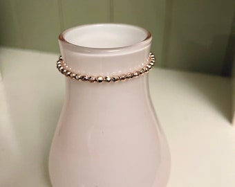 Rose gold bead stretch bracelet