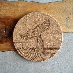 Kurk onderzetter - Pyrografie - Walvis oceaan illustratie