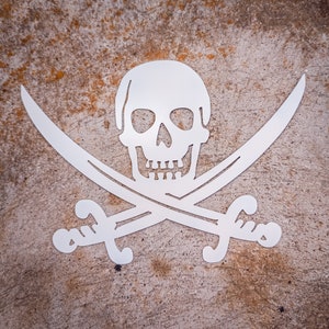 May include: A white metal pirate skull and crossbones design. The skull has two eye sockets and a toothy grin. The crossbones are formed by two swords with handles.